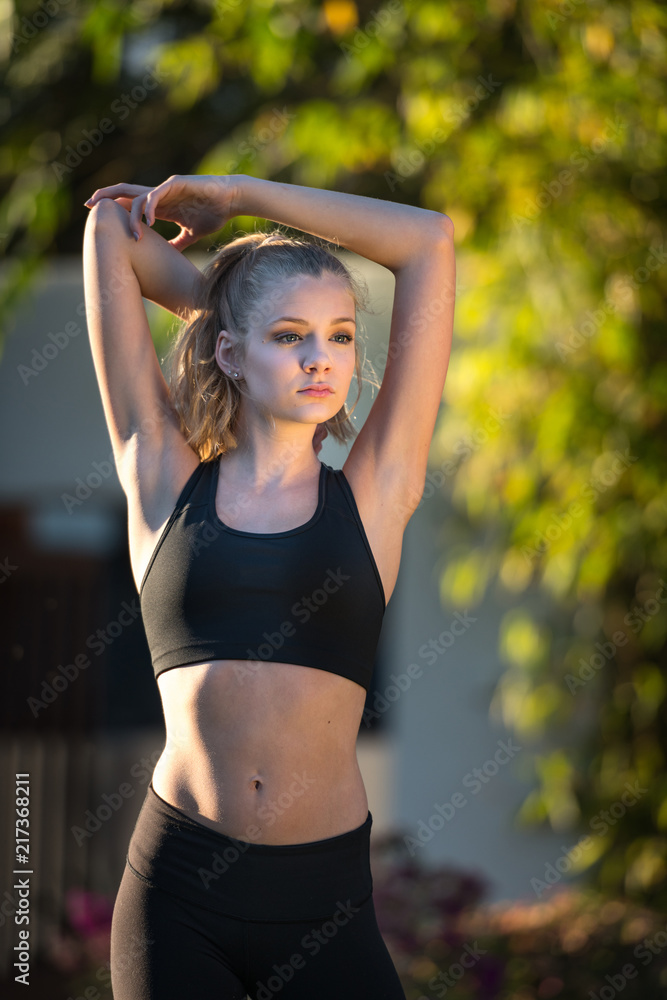 Blong Teen Girl Stretching in the Park Blong Teen Girl Stretching in the Park