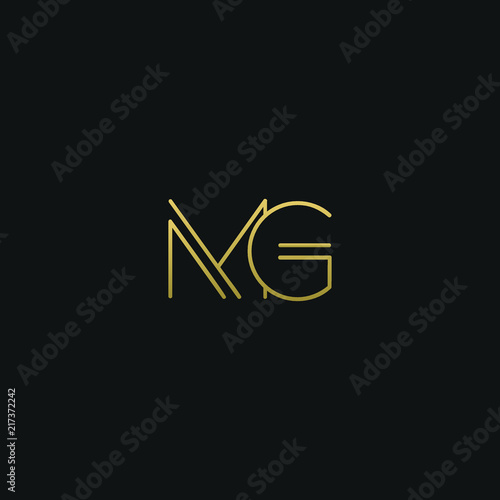 Creative modern elegant MG black and gold color initial based letter icon logo.