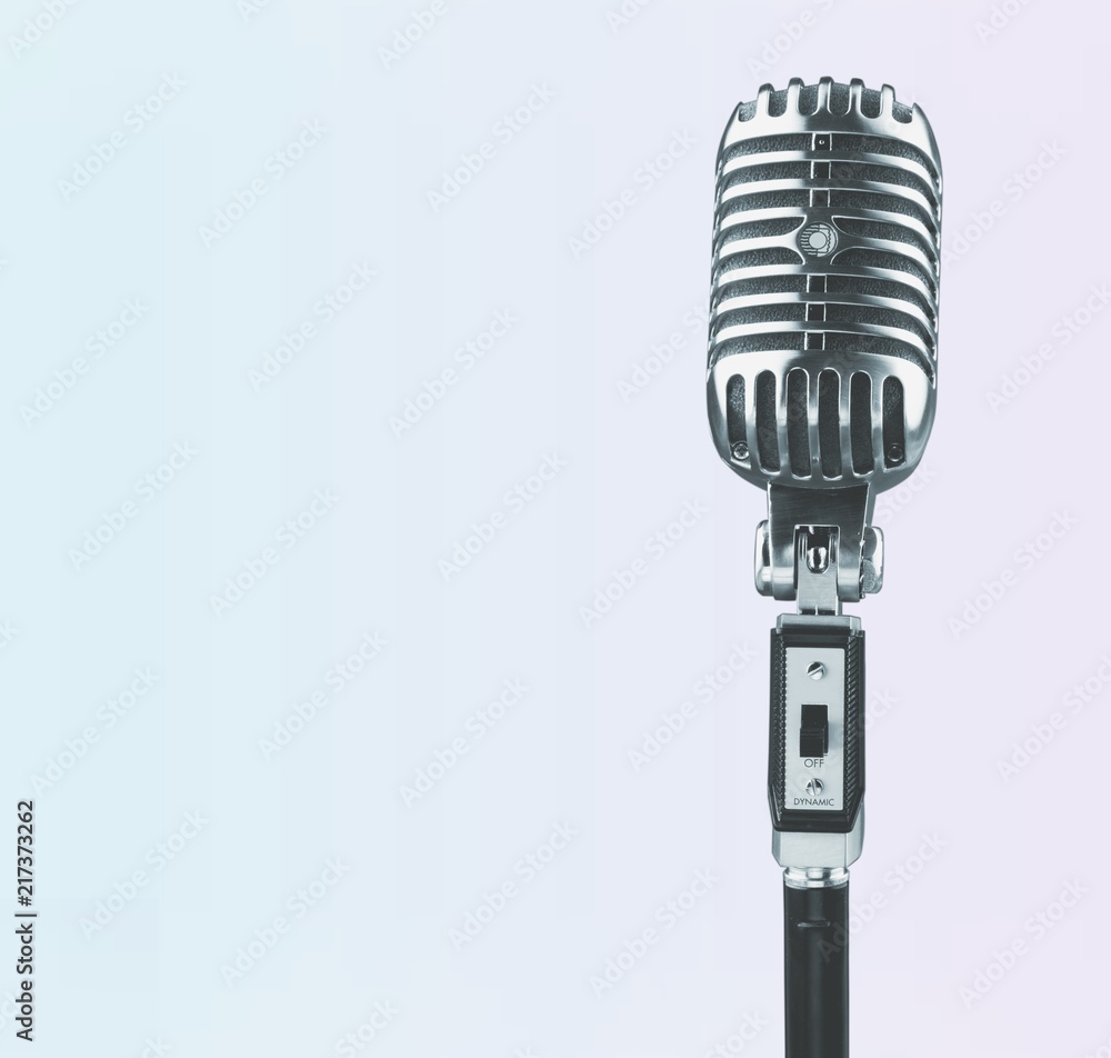 Fototapeta premium Retro style microphone on background
