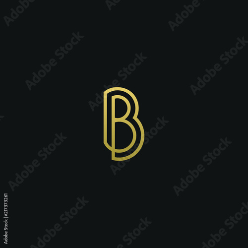 Unique modern trendy B black and gold color initial based icon logo. photo