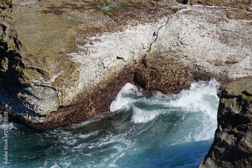 Close Up of Waves splashing against Rocks, Norah Head, Australia