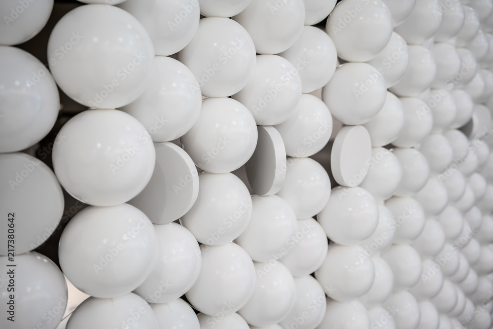Small white spheres and flat circle shapes wall for Interior design. Small white spheres and flat circle shapes wall for Interior design.
