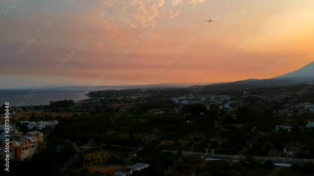 Summer evening sunset in Southern Spain, beautiful landscape images of the sun going down over the mountains in Southern Europe