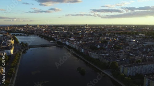 Drone shot over city with lakes can show both sunset and sunrise photo