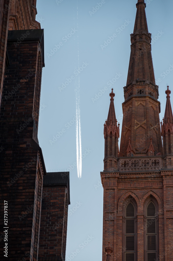 Plane flyiing between two buildings in Wiesbaden Germany