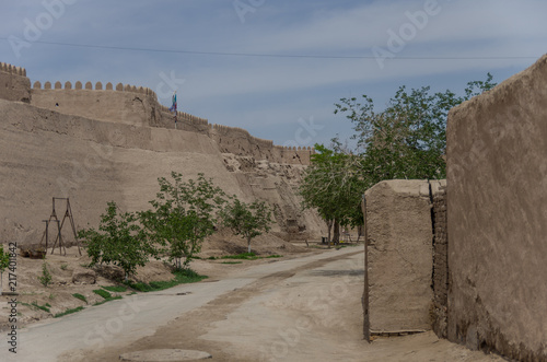 City walls of the ancient city of Ichan Kala in Khiva, a UNESCO heritage site in Uzbekistan photo
