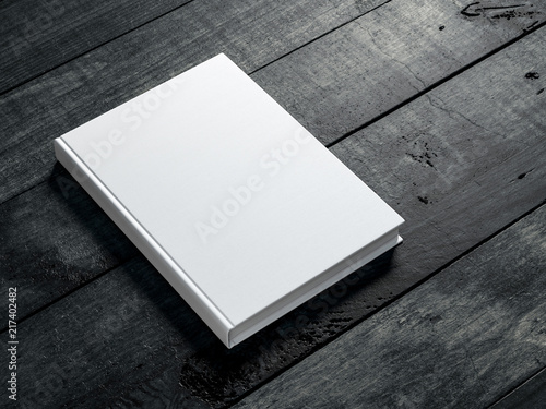 White book Mockup on dark wooden table background
