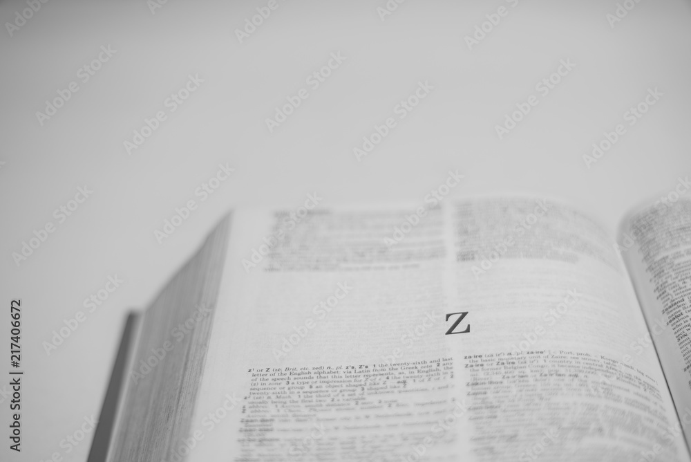 Roman A to Z alphabet printed on open book Roman A to Z alphabet printed on open book
