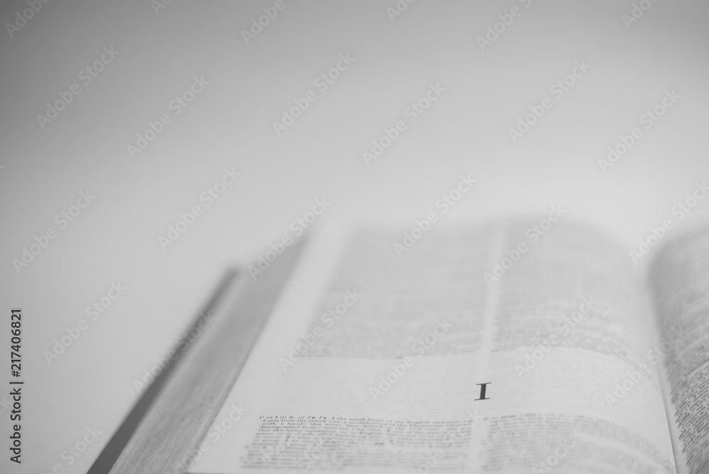 Roman A to Z alphabet printed on open book Roman A to Z alphabet printed on open book