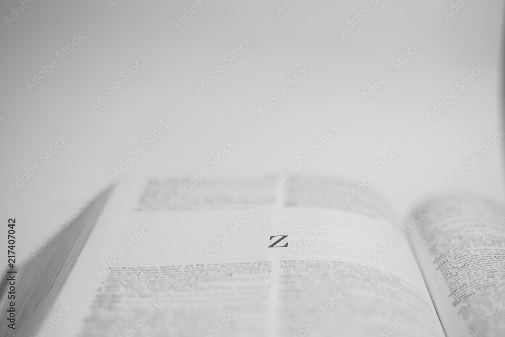 Roman A to Z alphabet printed on open book Roman A to Z alphabet printed on open book