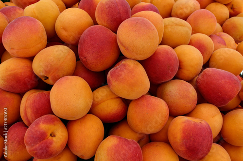 Peaches. A peach is a soft, juicy and fleshy fruit. Macro photography.
