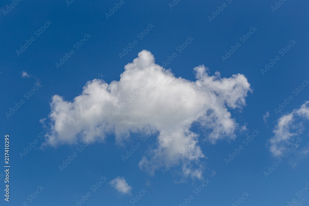 White fluffy clouds in the blue sky