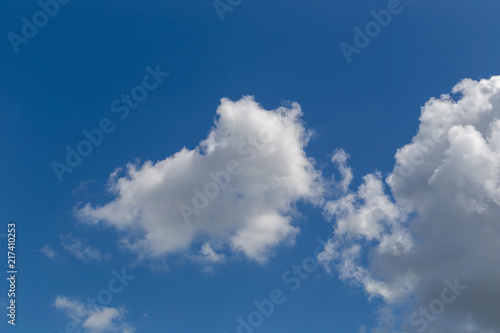 White fluffy clouds in the blue sky