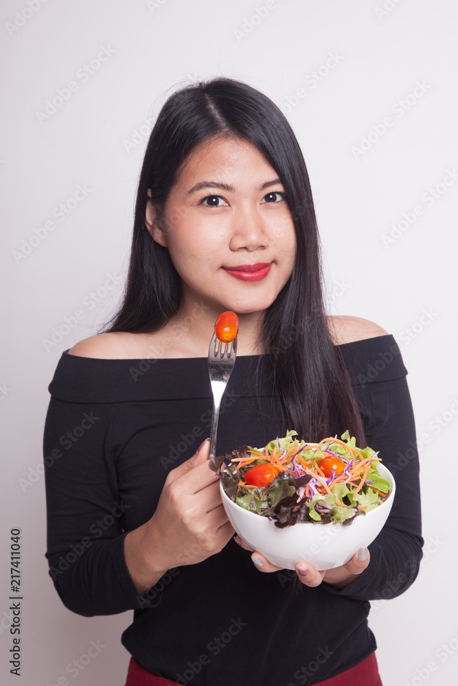 Healthy Asian woman with salad. Healthy Asian woman with salad.
