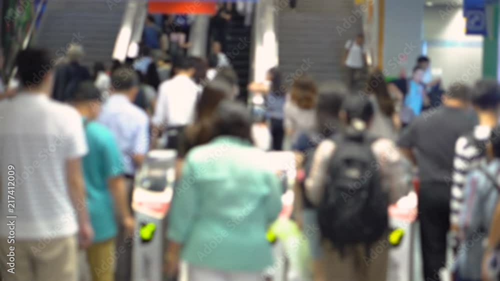 Crowd of Anonymous Asian Commuters Entering Subway Station During Rush Hour in Bangkok, Thailand Crowd of Anonymous Asian Commuters Entering Subway Station During Rush Hour in Bangkok, Thailand