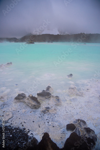 The Blue Lagoon geothermal spa and lava rocks in Iceland.