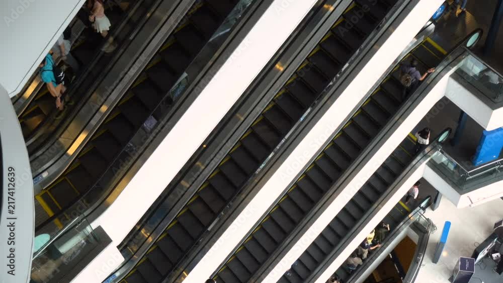 Escalators in Mall - Many Escalators Stacked From Top Down Perspective - Bangkok, Thailand - June, 2018 Escalators in Mall - Many Escalators Stacked From Top Down Perspective - Bangkok, Thailand - June, 2018