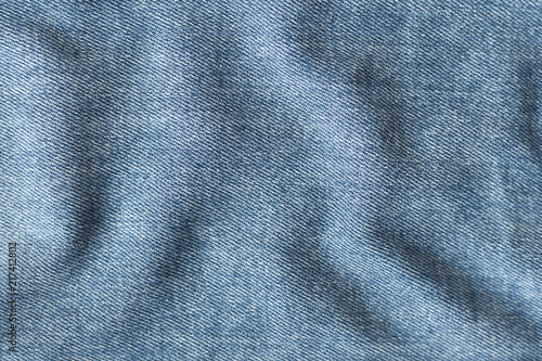Natural blue jeans texture background