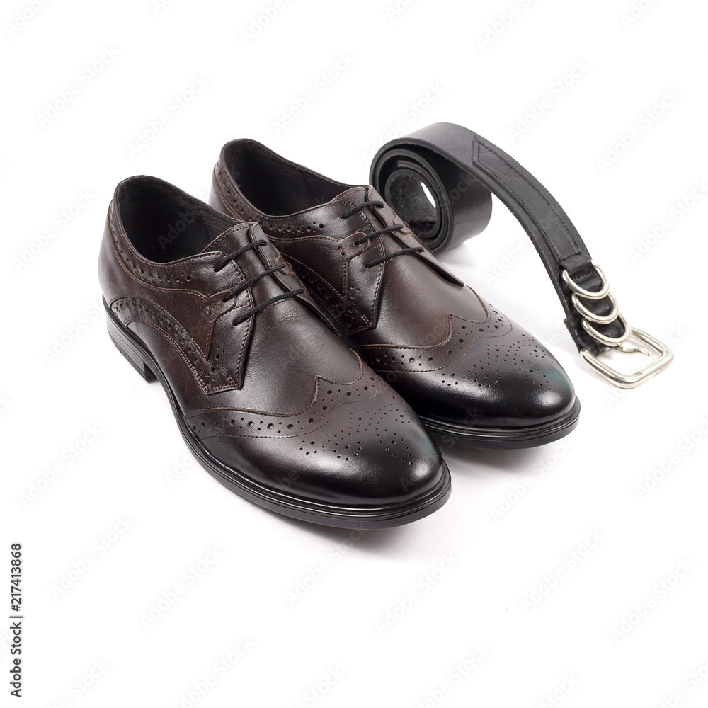 Isolated stylish leather men's dress shoes and accessories Isolated stylish leather men's dress shoes and accessories