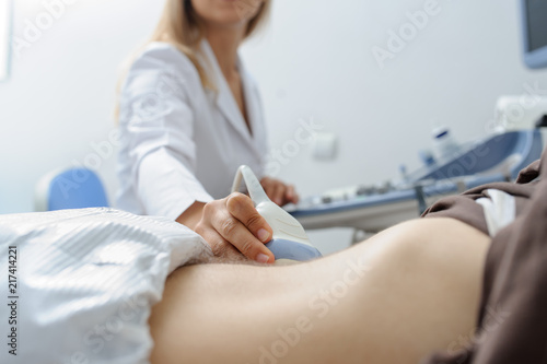Doctor  examination a man at abdomen  Usg