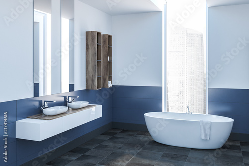 White and blue bathroom corner, white tub