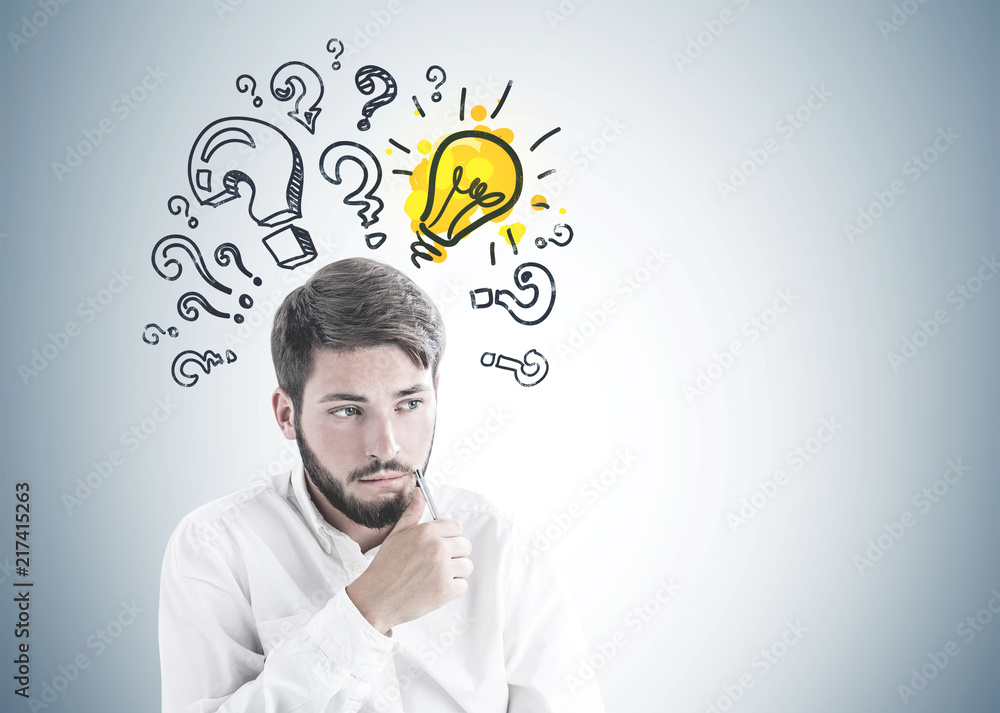 Thinking bearded young businessman answer question Thinking bearded young businessman answer question
