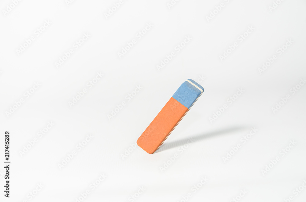 Eraser stands at an angle against a light background Eraser stands at an angle against a light background