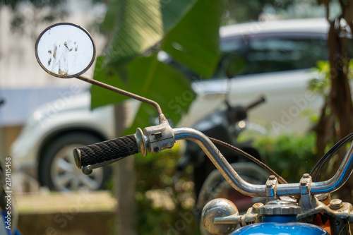 Left rear mirror and hand bar with brake system of vintage Japanese motorcycle © Kamchai