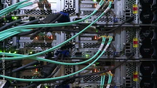 Back panel of powerful servers installed in the rack of the server room of the data center