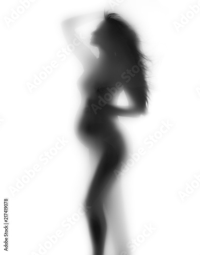 Pregnant woman shadow portrait isolated on white background. Silhouette of pregnant woman touching her belly. Pregnancy concept. Baby Shower