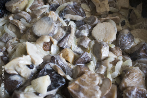 Sour cream sauce with mushrooms and onion. Very appetizing and delicious broth with mushrooms. Macro of food. Useful and sports nutrition for every day