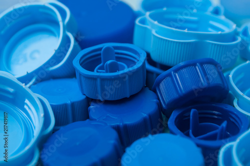 closeup of blue plastic plugs for recycling