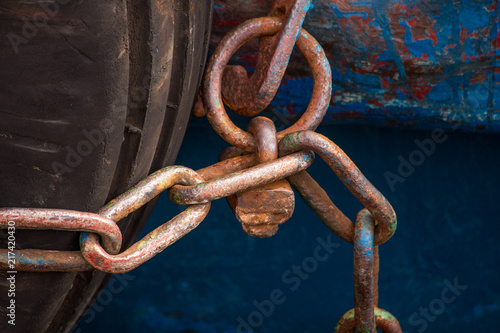 Rusty chain with padlock is close