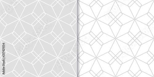 Light gray geometric ornaments. Set of seamless patterns