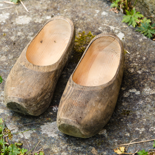Closeup wooden dutch shoes, traditional clogs footwear