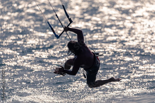 A silhouette of a kitesurfer in Tarifa, Spain. 