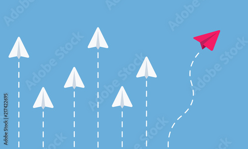 Paper airplanes flying. 5 white airplanes and one red. Business concept. Think different. Vector illustration.