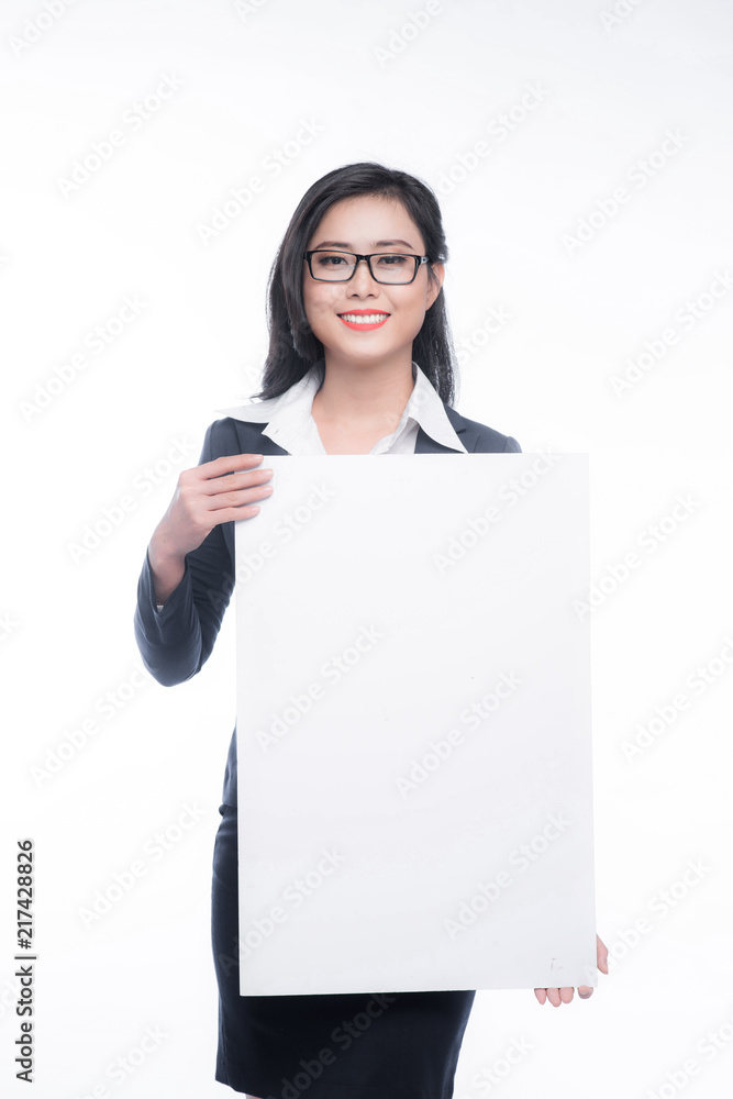 Young asian business woman showing a white board isolated on white background. Young asian business woman showing a white board isolated on white background.
