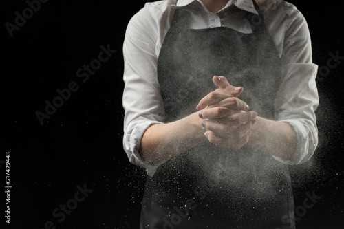 handmade cotton chef with mold flour on a black background