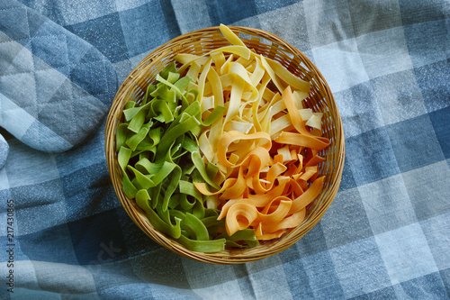 mixed colorful of pasta in basket