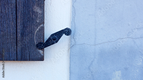 Fragment wall with old wood window detail photo