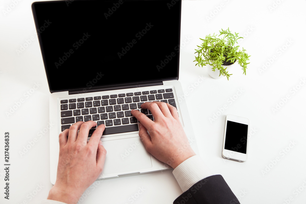 Man hand on laptop keyboard Man hand on laptop keyboard