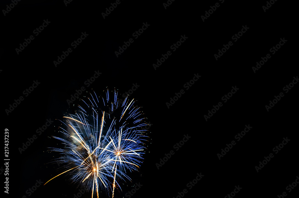 colorful fireworks on the black sky background over-water