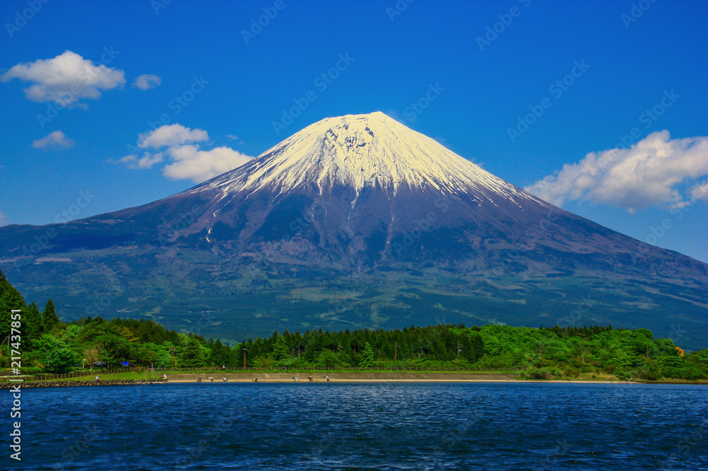Mount Fuji, Japan - probably the most famous landmark in Japan, Mount Fuji stands 3776 meters high. Here in particular a picture of the volcano in Spring, with snow on the top Mount Fuji, Japan - probably the most famous landmark in Japan, Mount Fuji stands 3776 meters high. Here in particular a picture of the volcano in Spring, with snow on the top