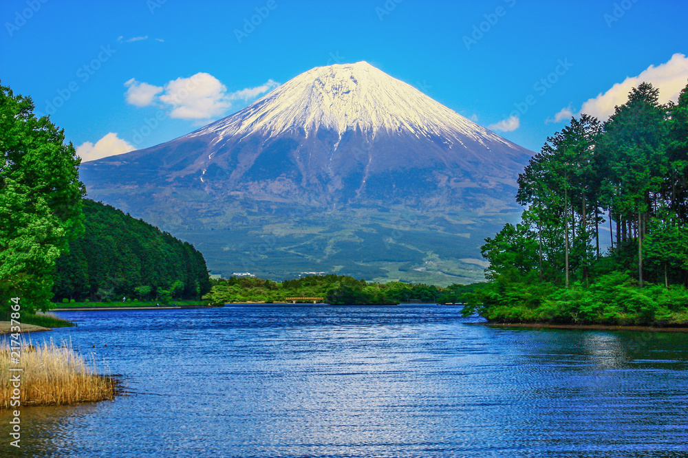 Mount Fuji, Japan - probably the most famous landmark in Japan, Mount Fuji stands 3776 meters high. Here in particular a picture of the volcano in Spring, with snow on the top