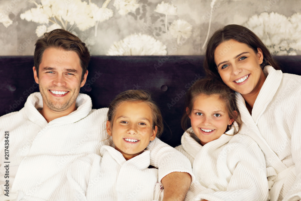 Happy family relaxing in hotel room Happy family relaxing in hotel room
