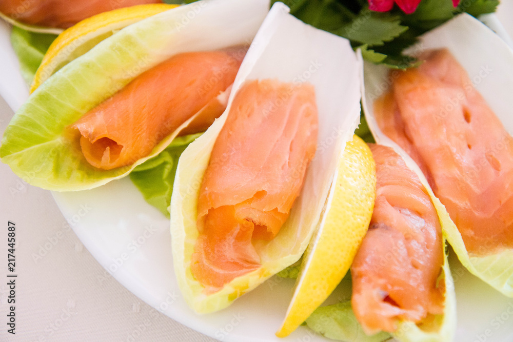 Salmon starter served on a cabbage leaf Salmon starter served on a cabbage leaf