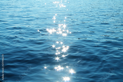 glare from the sun on the water, solar path in the sea
