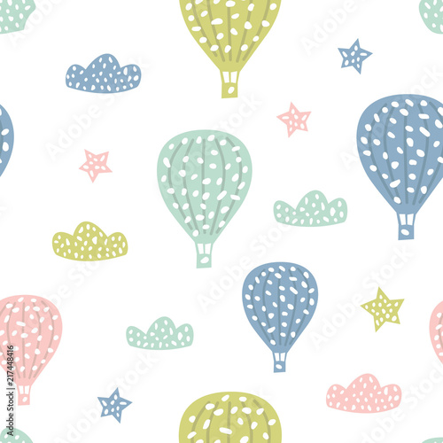 Childish seamless pattern with cute hot air balloon. Creative texture for fabric