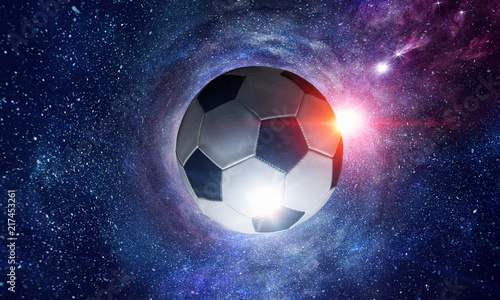 Fototapeta Naklejka Na Ścianę i Meble -  Soccer ball in cosmos